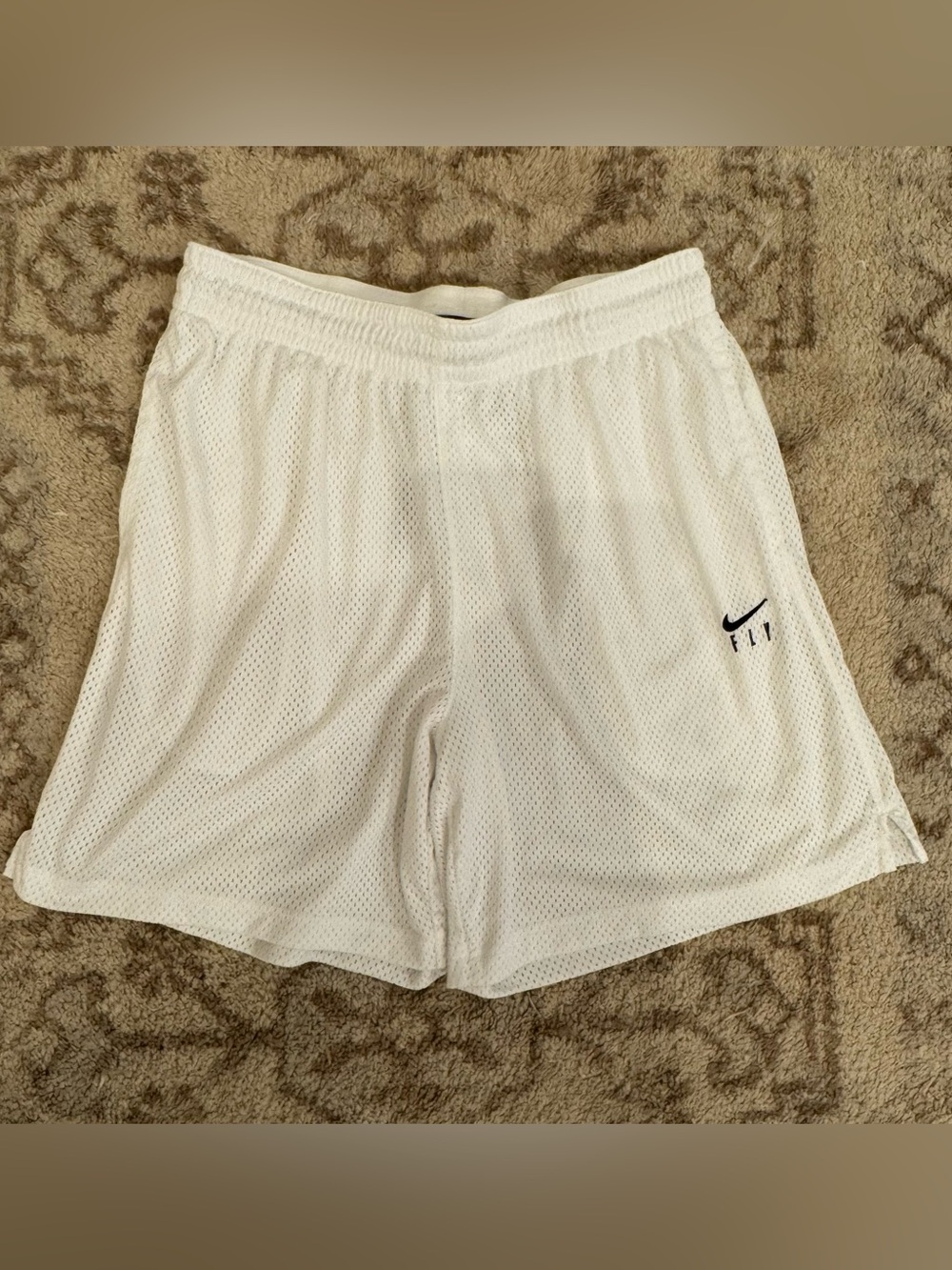 Nike Ladie’s White Mesh Athletic Shorts with Black Swoosh